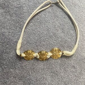 Brass and ivory rope stretch belt